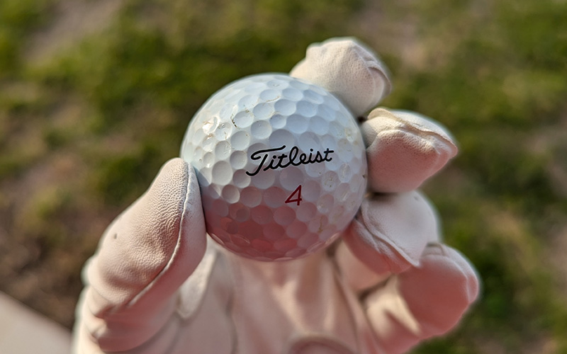 Urethane golf ball with some small scuffs on the surface